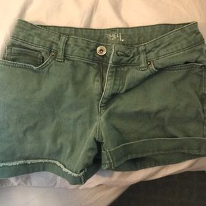 Green denim shorts